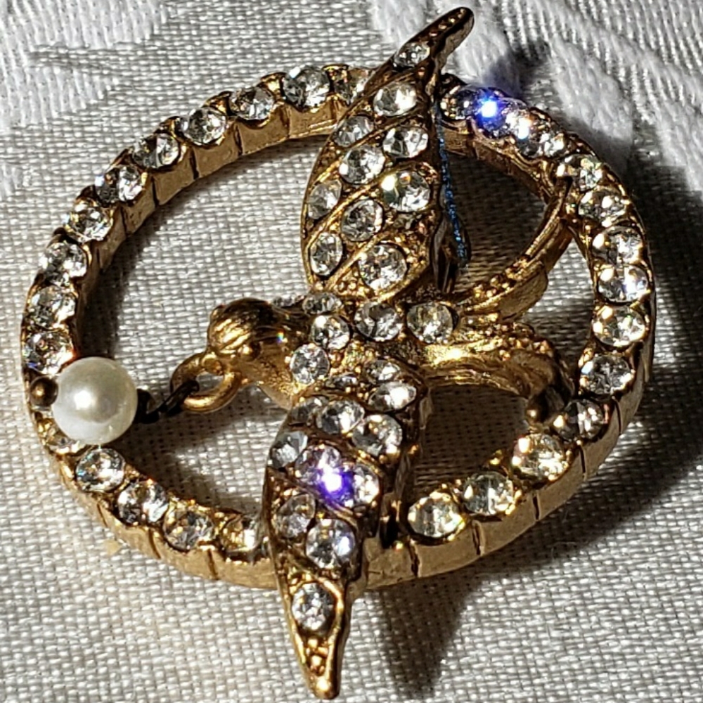 Swallow bird brooch by Pilgram.